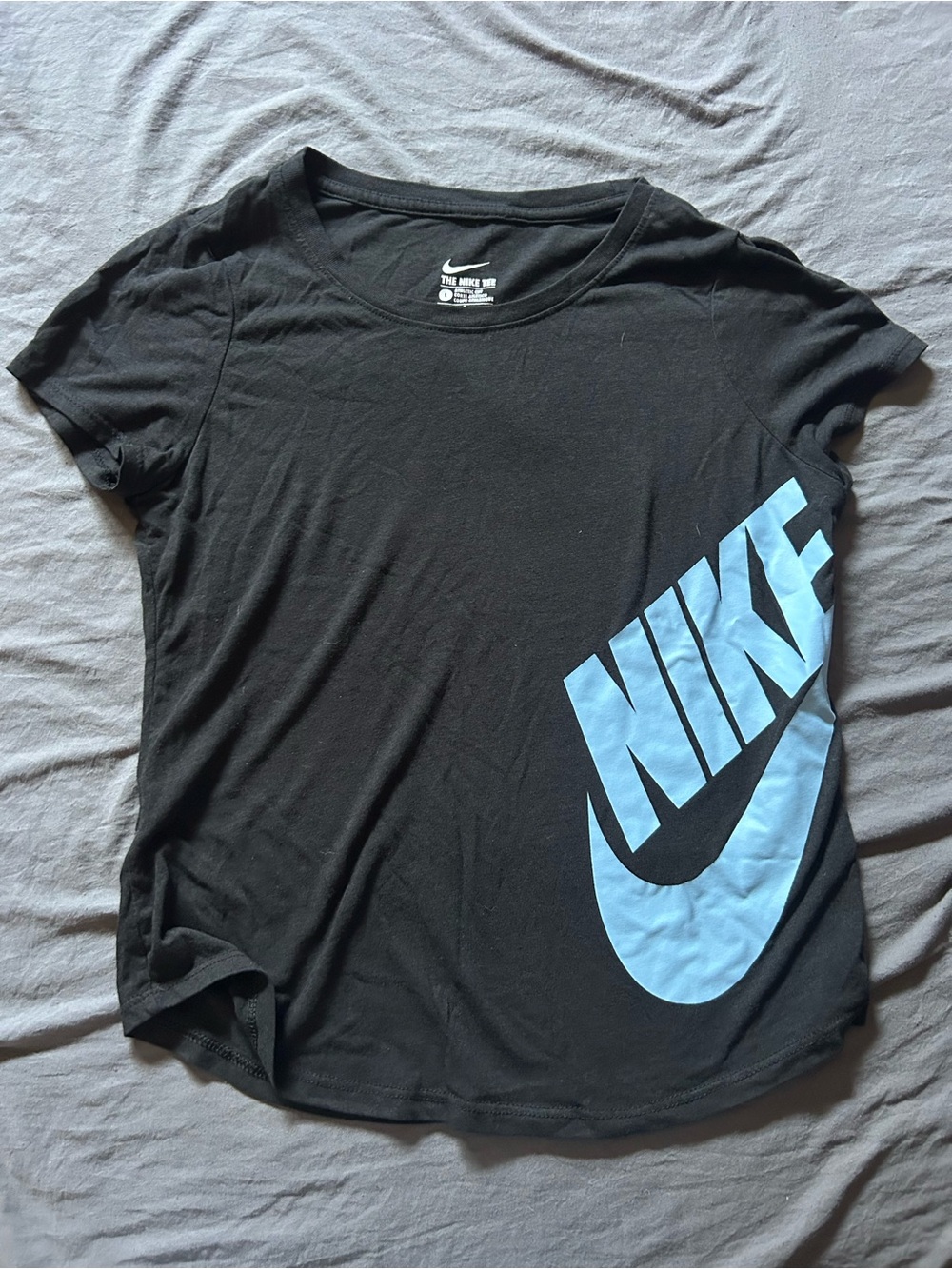 Nike Girl’s Black Tee with Blue Logo